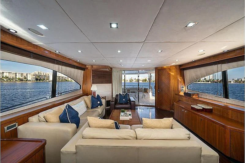 a living room with a large window aboard BEYOND Yacht for Sale