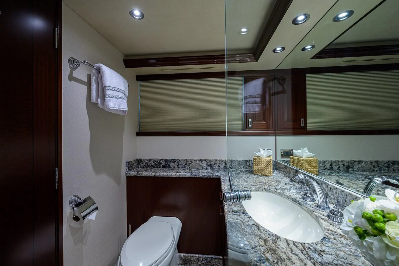 a bathroom with a sink and a mirror aboard DETERMINATION Yacht for Sale