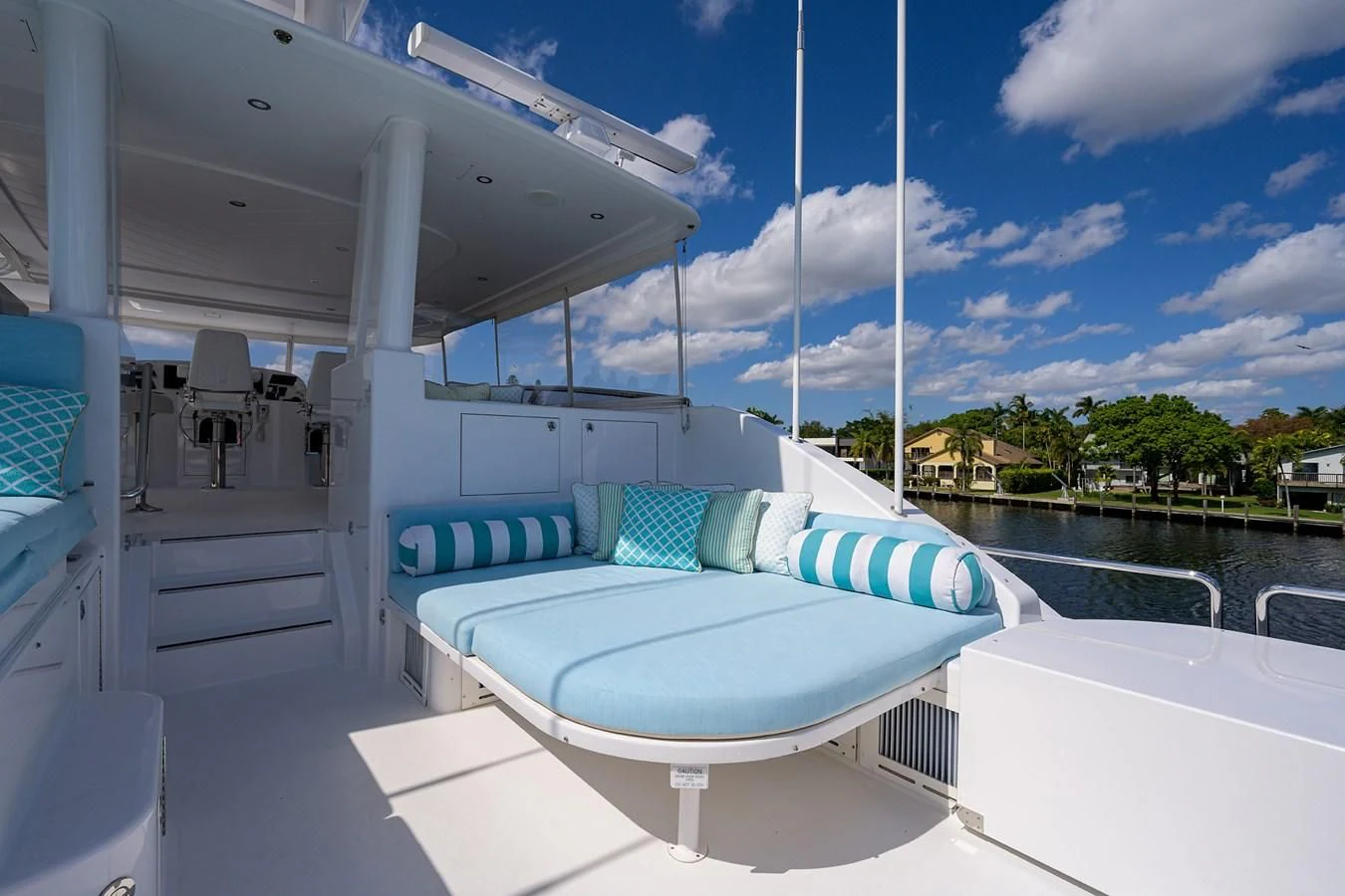 a lounge chair on a deck aboard DETERMINATION Yacht for Sale