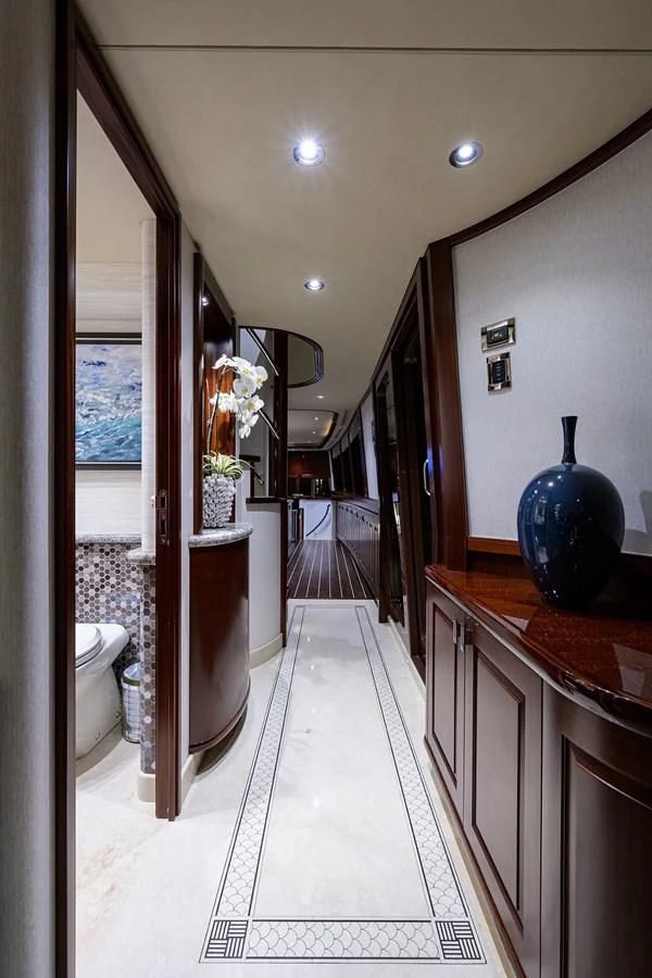 a bathroom with a glass shower aboard DETERMINATION Yacht for Sale