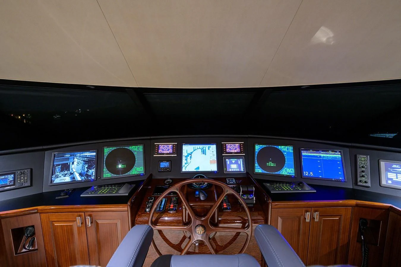 a room with many monitors and a bicycle aboard DETERMINATION Yacht for Sale