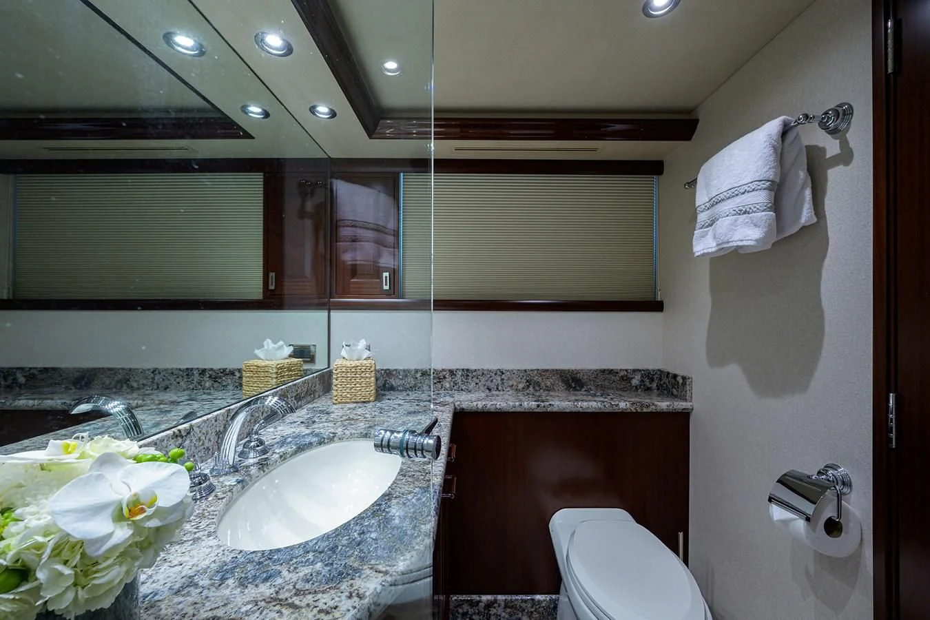 a bathroom with a sink and a toilet aboard DETERMINATION Yacht for Sale
