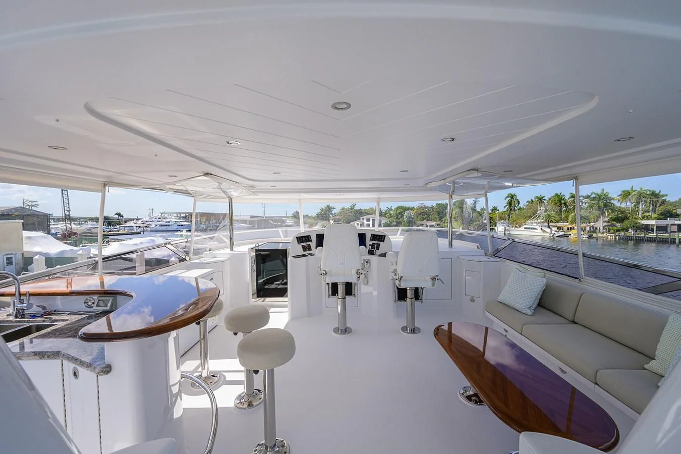 a room with a couch and chairs aboard DETERMINATION Yacht for Sale