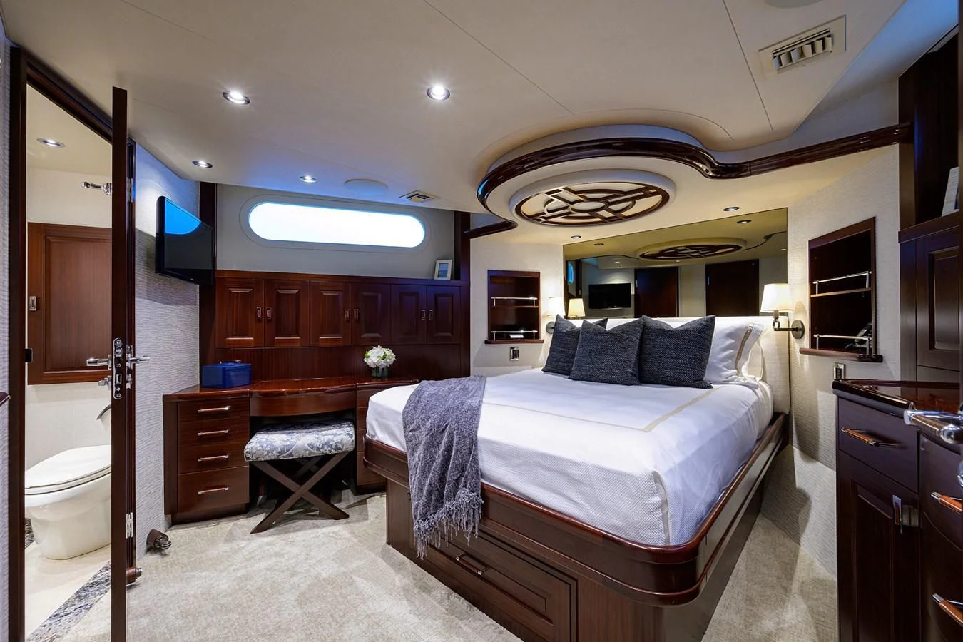 a large bathroom with a large bed aboard DETERMINATION Yacht for Sale