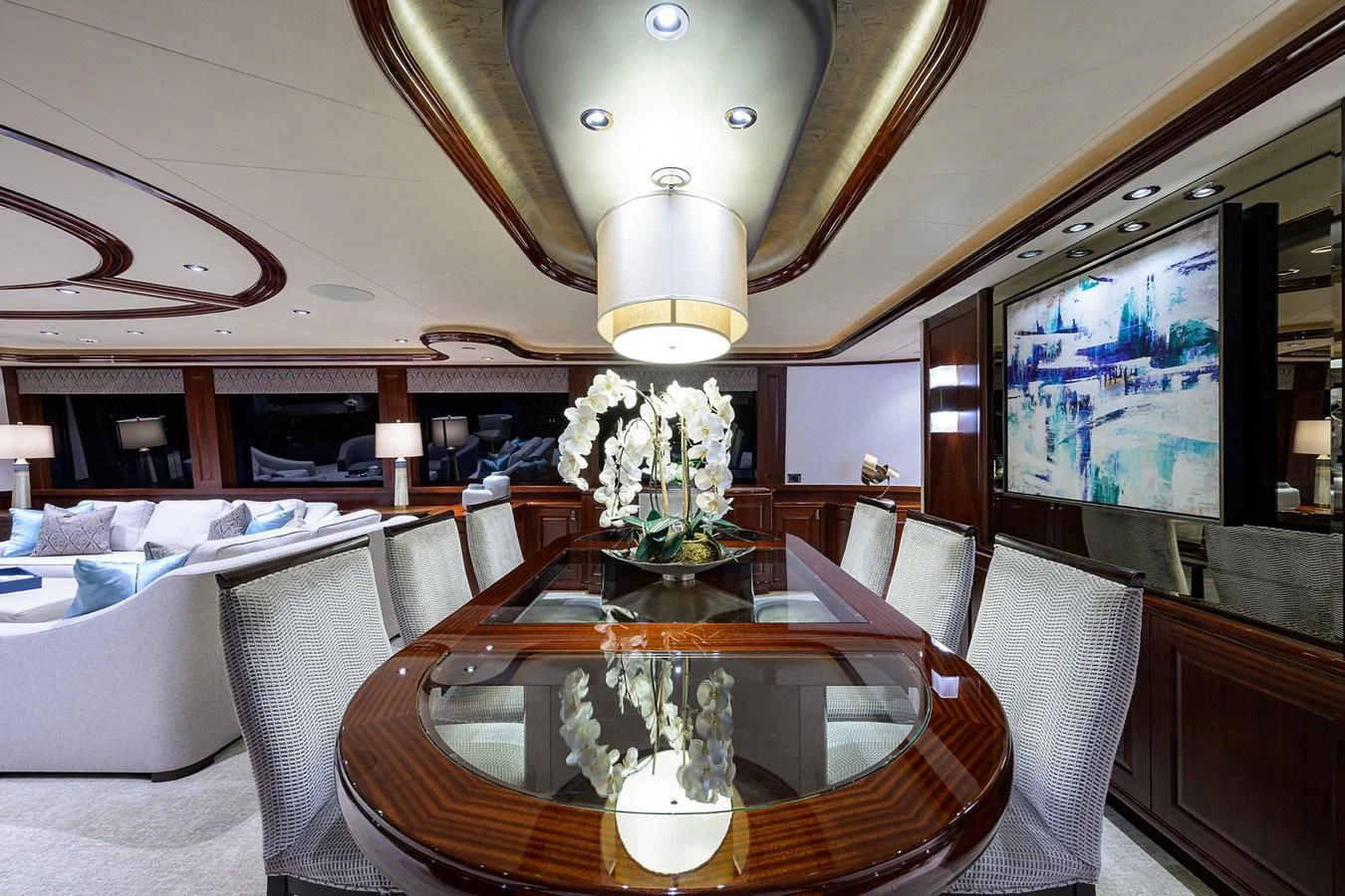 a room with a table and chairs aboard DETERMINATION Yacht for Sale