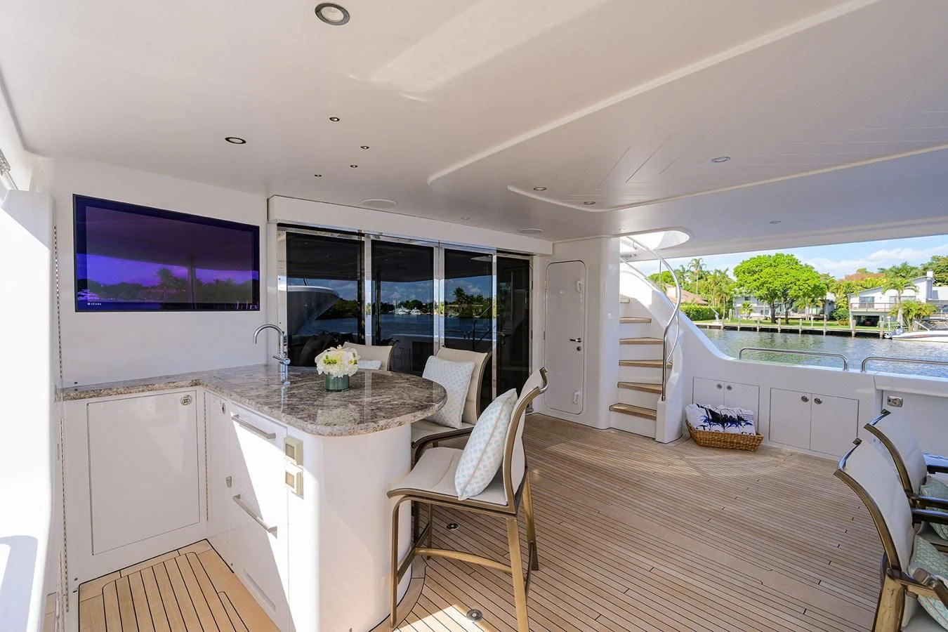 a kitchen with a large tv aboard DETERMINATION Yacht for Sale