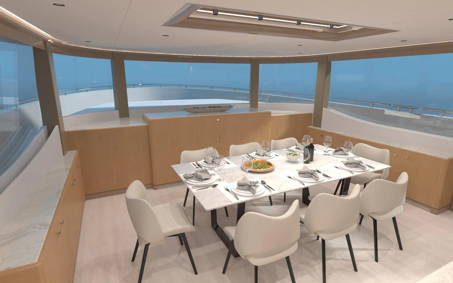 a room with a table and chairs aboard SALT & LIGHT Yacht for Sale