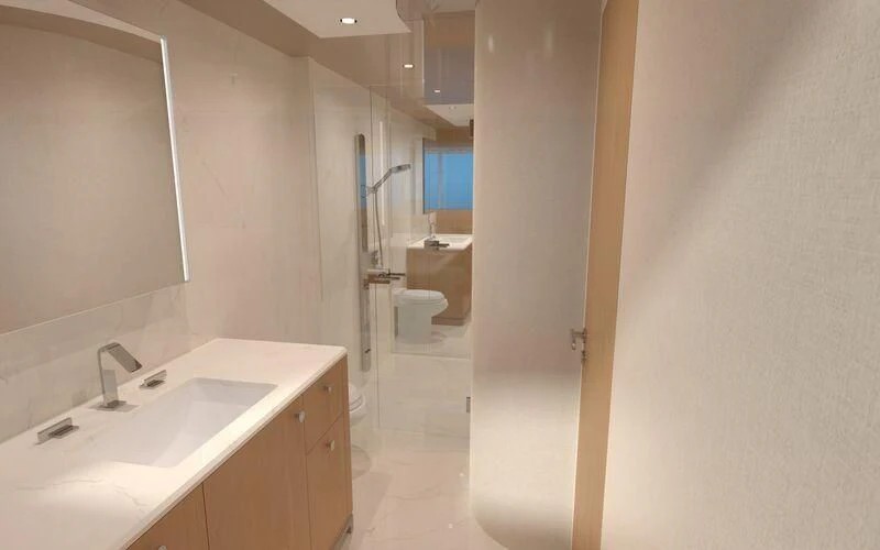 a bathroom with a sink and a mirror aboard SALT & LIGHT Yacht for Sale