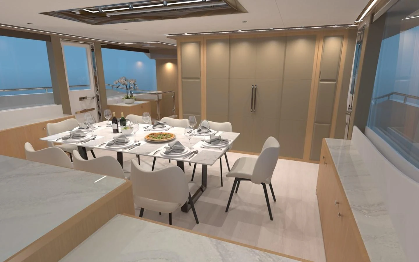 a room with tables and chairs aboard SALT & LIGHT Yacht for Sale