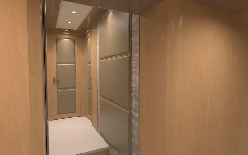 a room with a closet and a bed aboard SALT & LIGHT Yacht for Sale