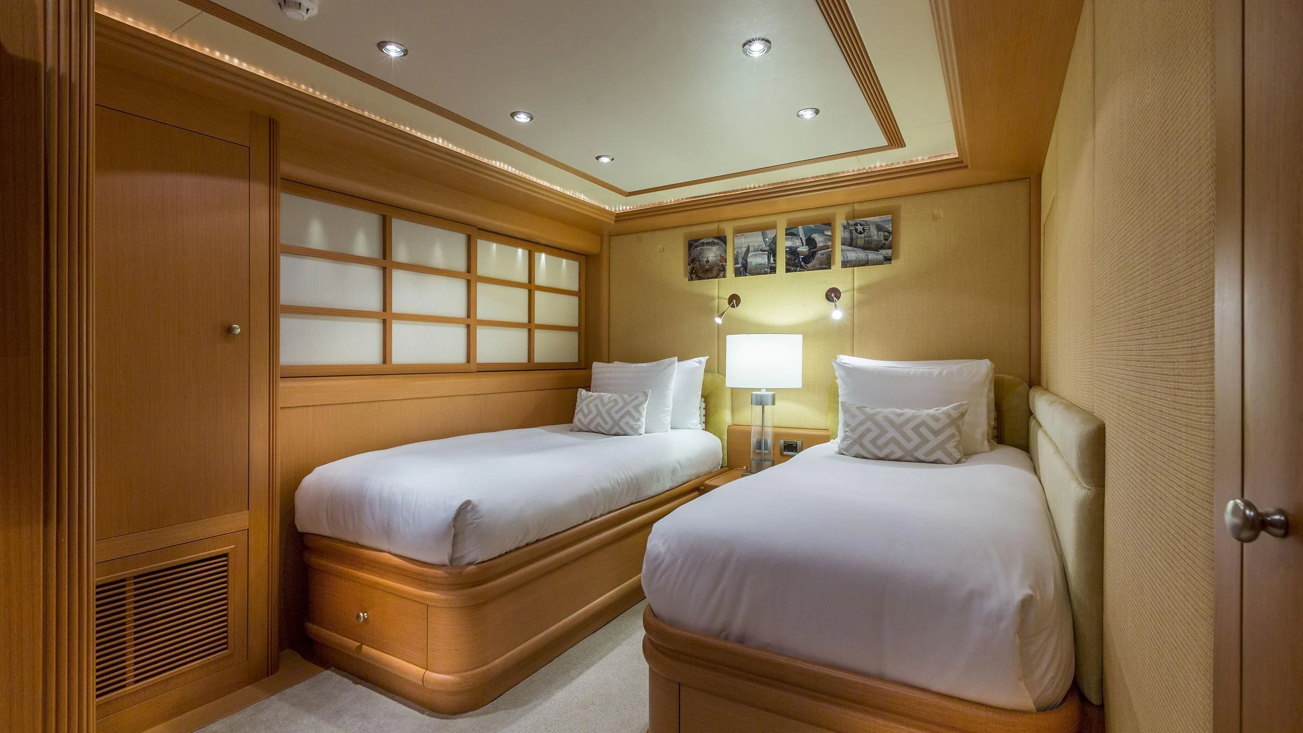 a couple of beds in a hotel room aboard DEDE Yacht for Sale