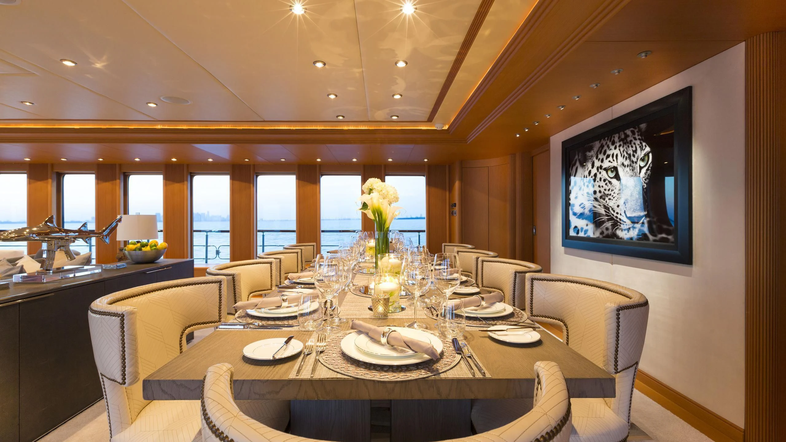 a dining room with a table set aboard DEDE Yacht for Sale