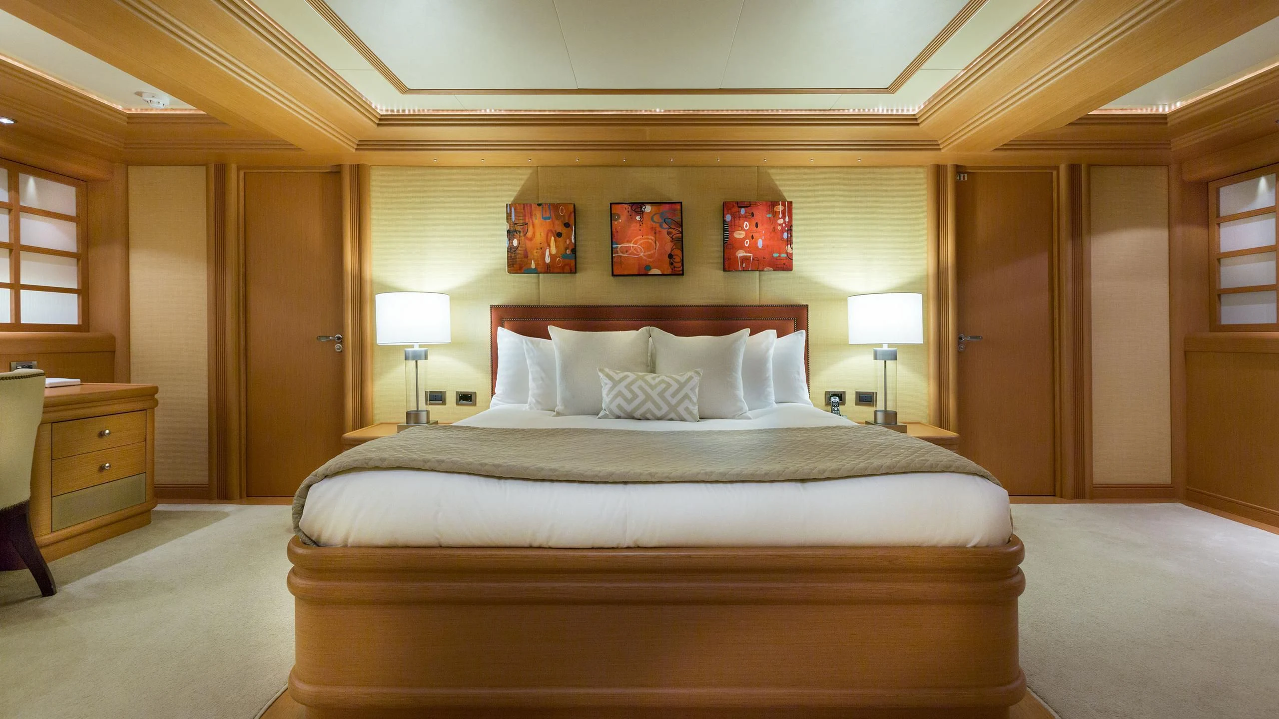 a large bed in a hotel room aboard DEDE Yacht for Sale