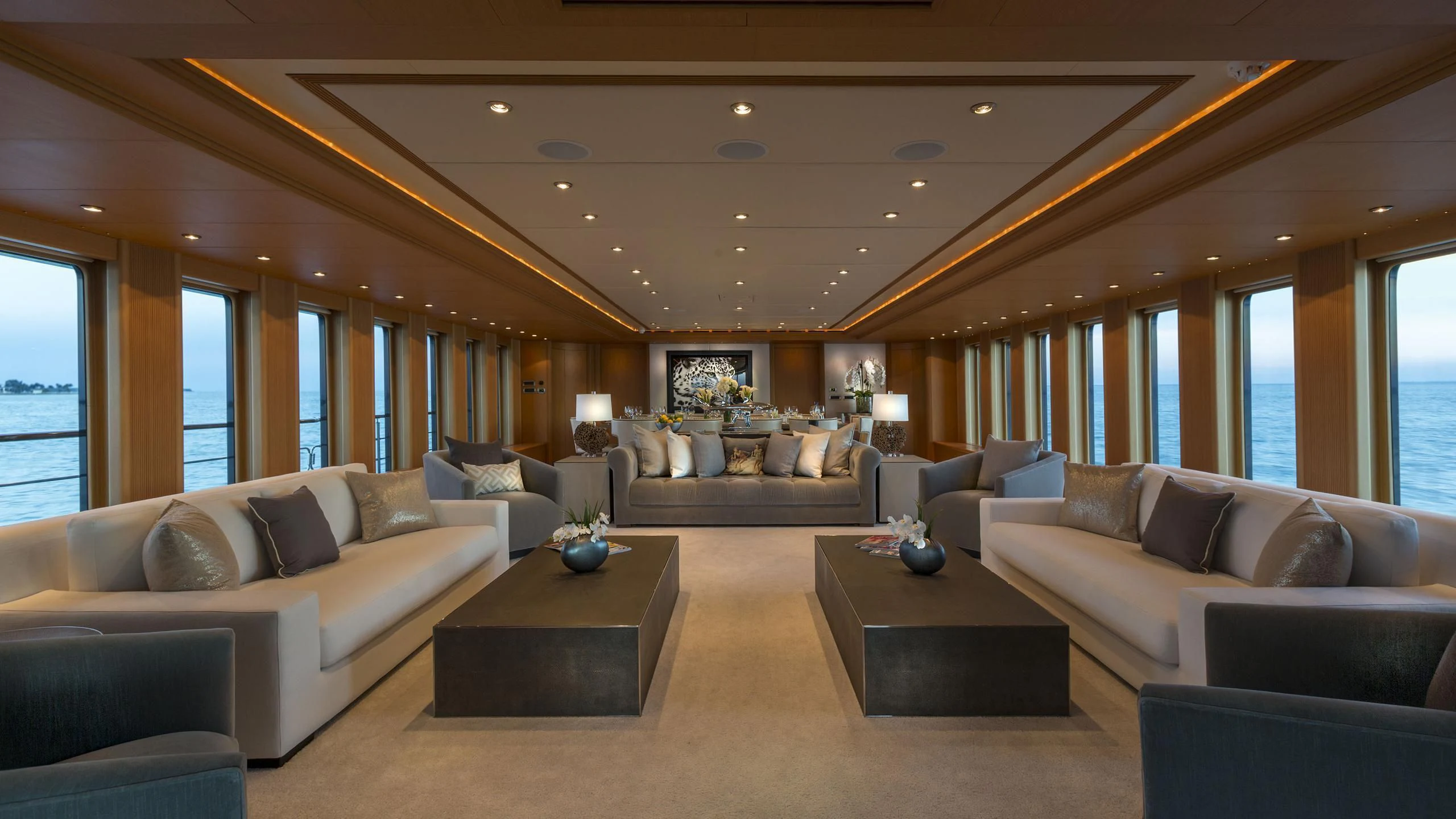 a living room with a couch and a coffee table aboard DEDE Yacht for Sale