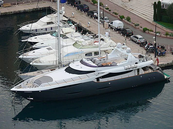 a boat parked on the side of a river aboard KHALILI Yacht for Sale
