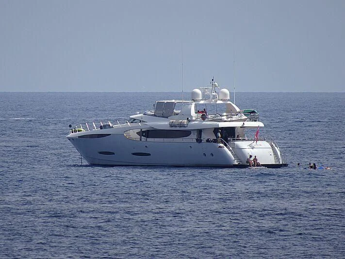 a white boat in the water aboard KHALILI Yacht for Sale