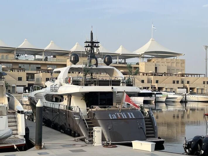 a boat docked at a pier aboard KHALILI Yacht for Sale