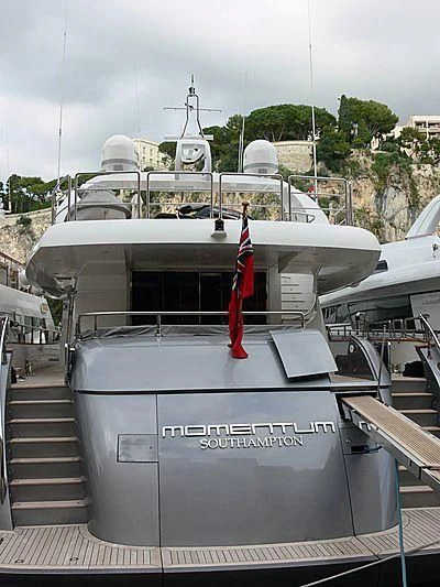 a boat with a flag on the deck aboard KHALILI Yacht for Sale