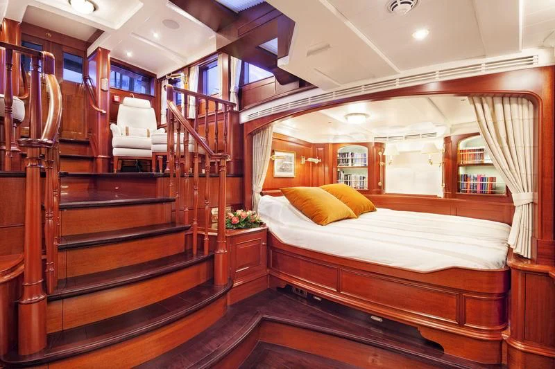 a bed in a room aboard KAMAXITHA Yacht for Sale
