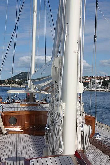 a sailboat on a deck aboard KAMAXITHA Yacht for Sale