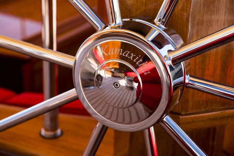a close-up of a bicycle wheel aboard KAMAXITHA Yacht for Sale