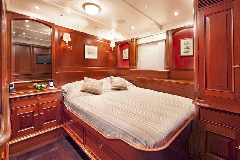 a bed in a room aboard KAMAXITHA Yacht for Sale