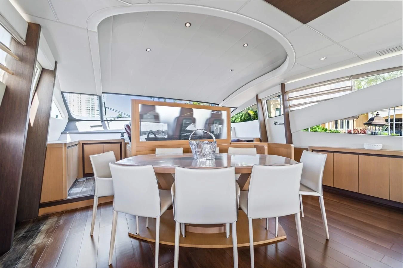 a large kitchen with a table and chairs aboard JERICO V Yacht for Sale