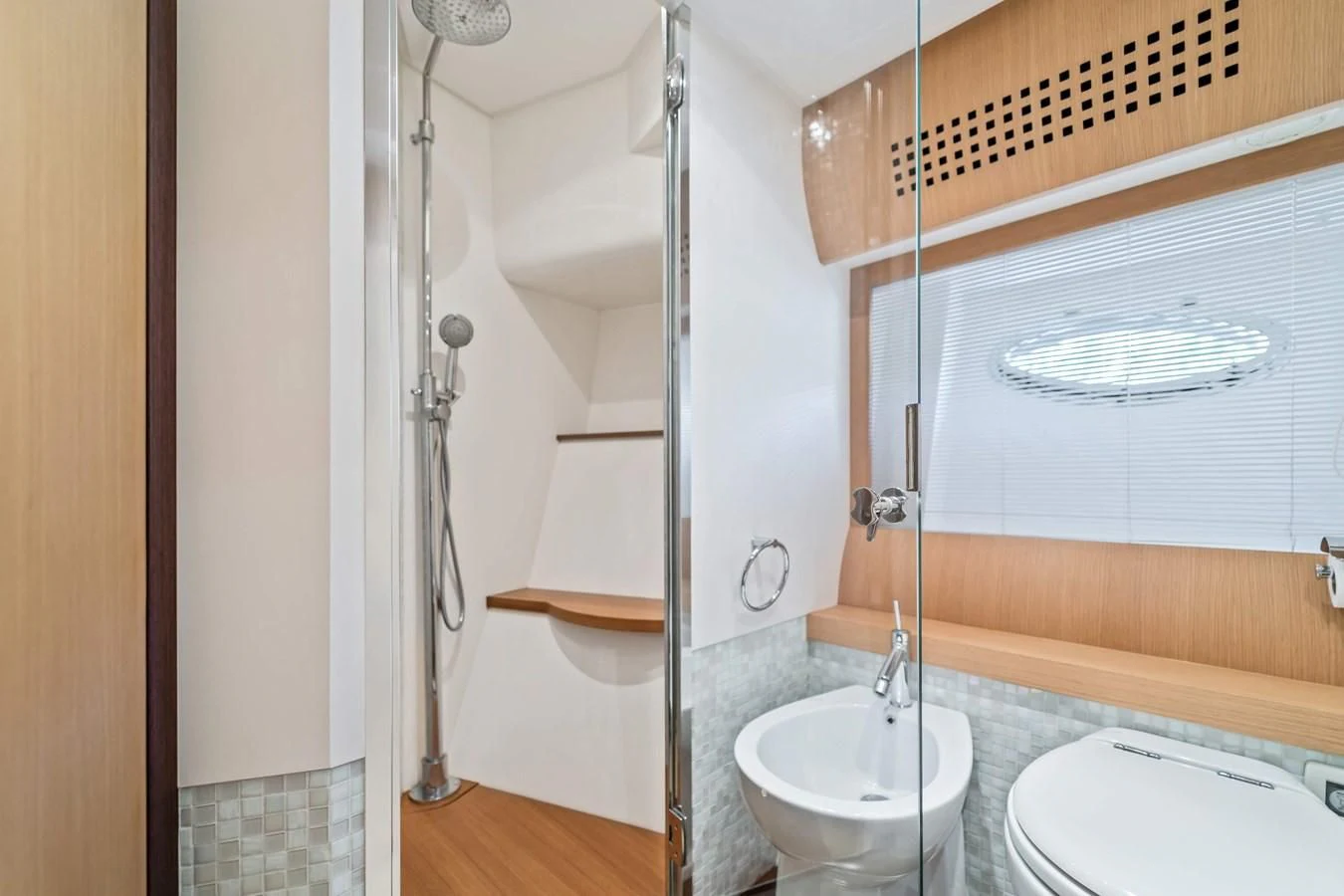 a bathroom with a sink and a mirror aboard JERICO V Yacht for Sale