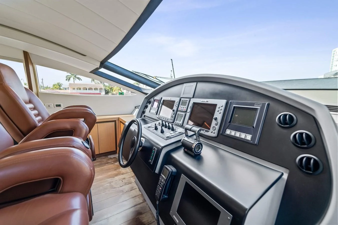 inside of a car aboard JERICO V Yacht for Sale