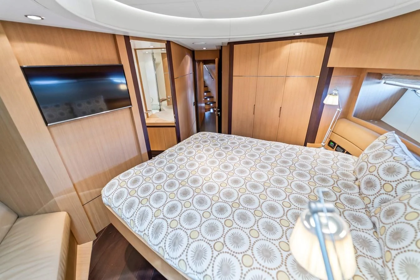 a bed with a white sheet aboard JERICO V Yacht for Sale