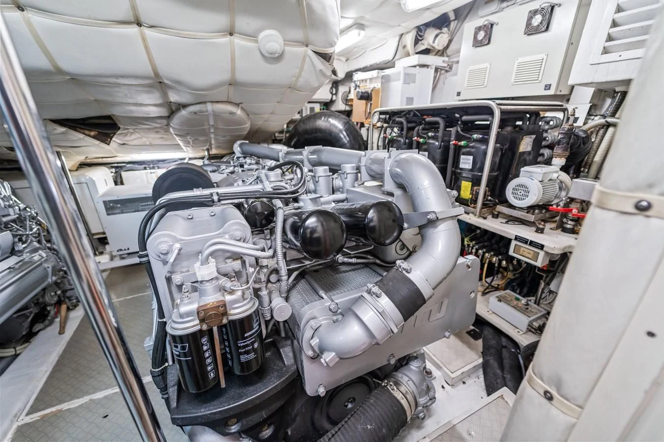 a car engine in a garage aboard JERICO V Yacht for Sale