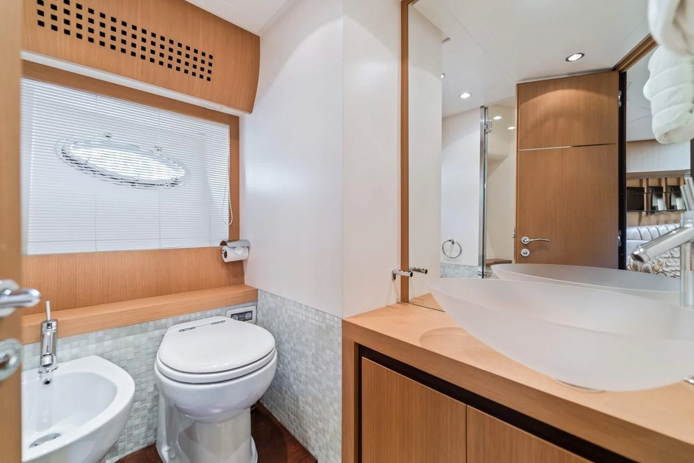 a bathroom with a sink toilet and a bathtub aboard JERICO V Yacht for Sale