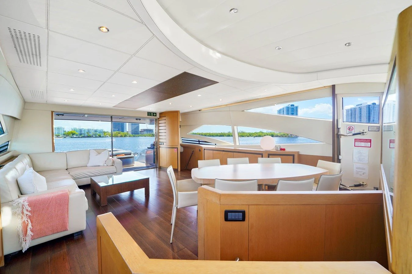 a room with a couch and a table aboard JERICO V Yacht for Sale
