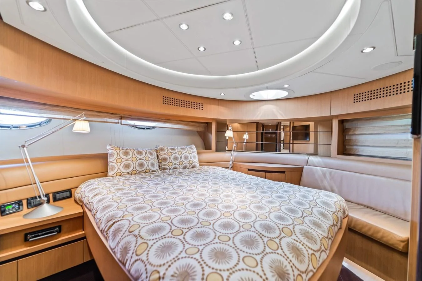 a large bed in a room aboard JERICO V Yacht for Sale