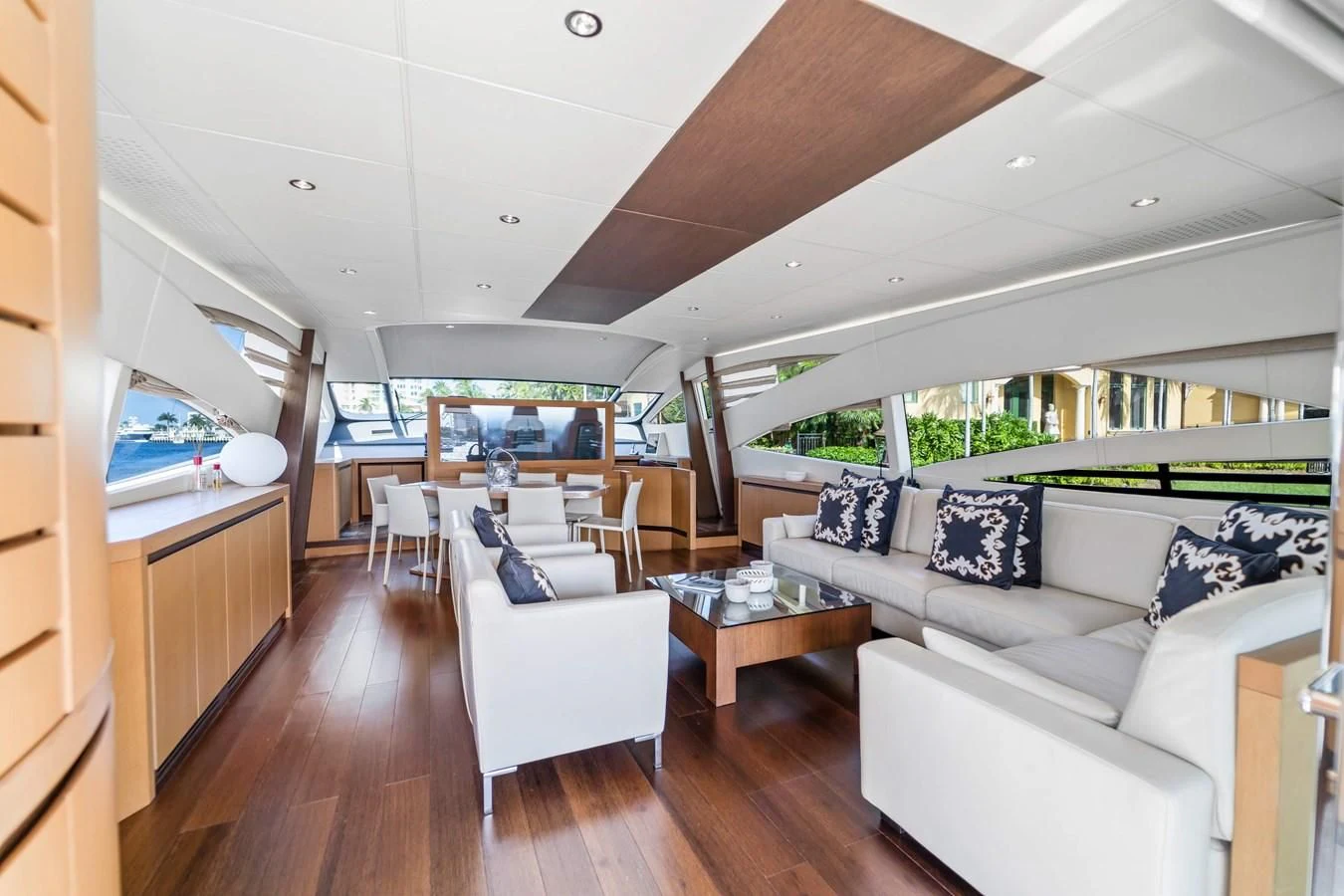 a living room with a large window aboard JERICO V Yacht for Sale
