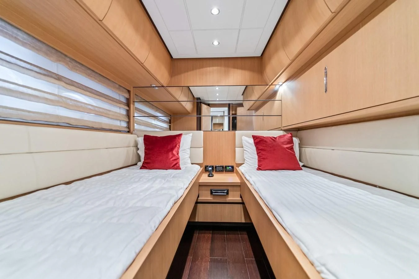 a room with two beds aboard JERICO V Yacht for Sale