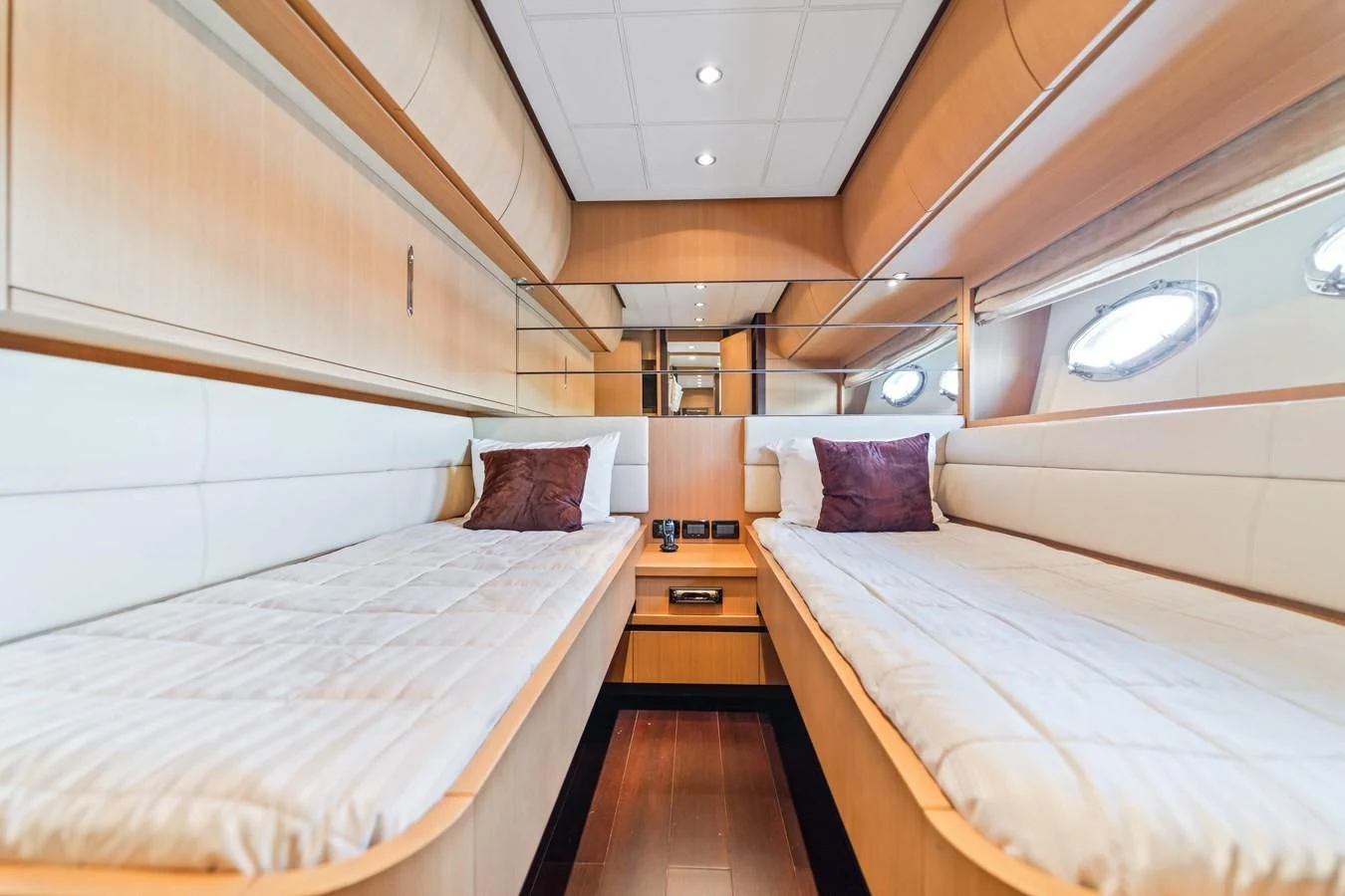 a room with two beds aboard JERICO V Yacht for Sale