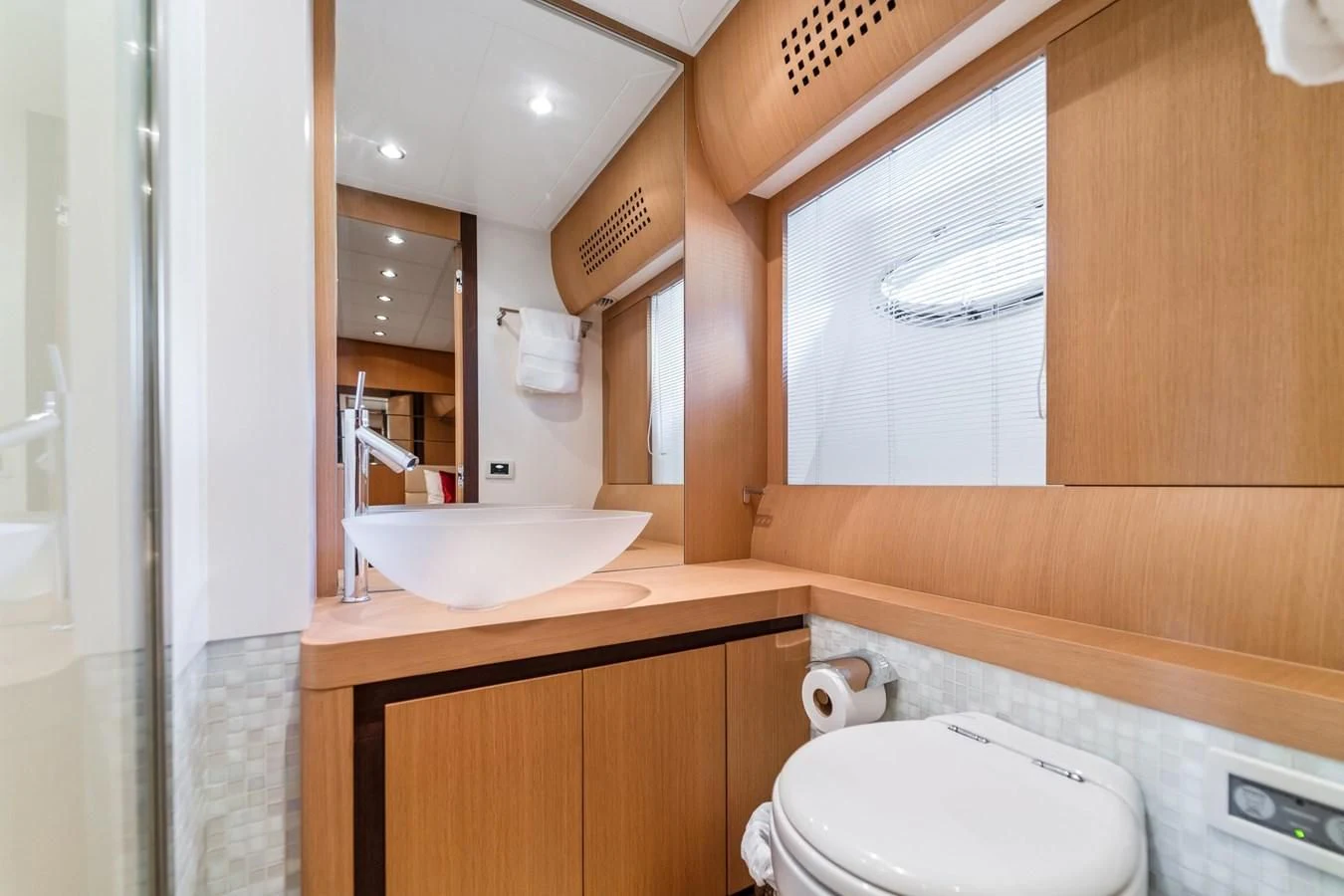 a bathroom with a sink and a toilet aboard JERICO V Yacht for Sale