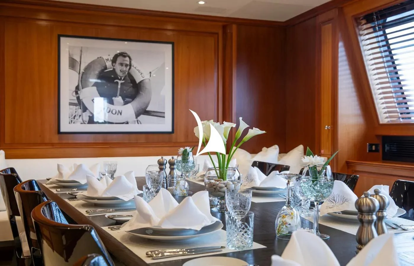 a table with a picture on it aboard PERSEUS Yacht for Sale