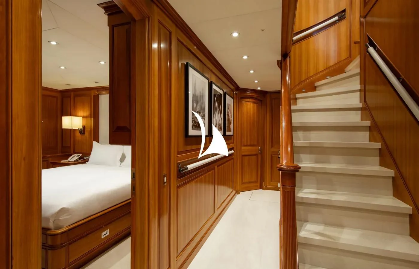 a room with a bed and a staircase aboard PERSEUS Yacht for Sale