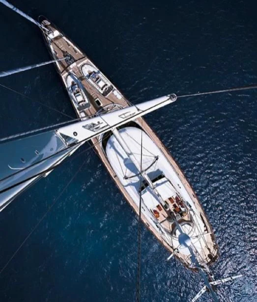 a large ship in the water aboard PERSEUS Yacht for Sale