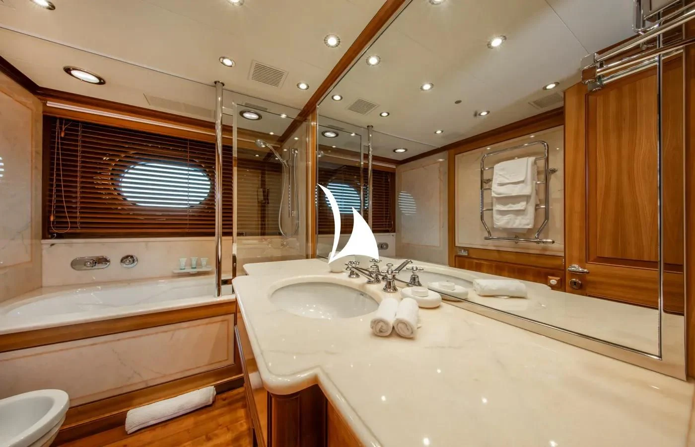 a bathroom with a large mirror aboard PERSEUS Yacht for Sale