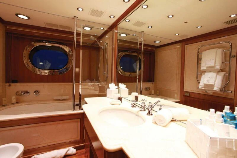 a bathroom with a large mirror aboard PERSEUS Yacht for Sale