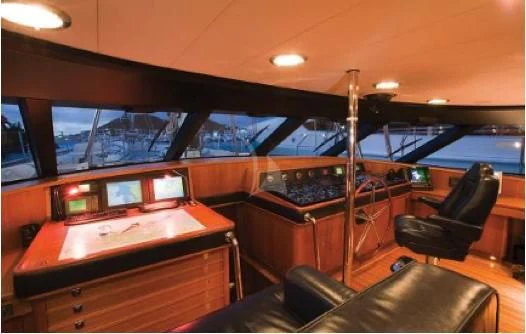 a piano in a room aboard PERSEUS Yacht for Sale