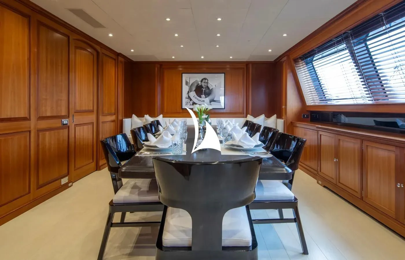a kitchen with a dining table aboard PERSEUS Yacht for Sale
