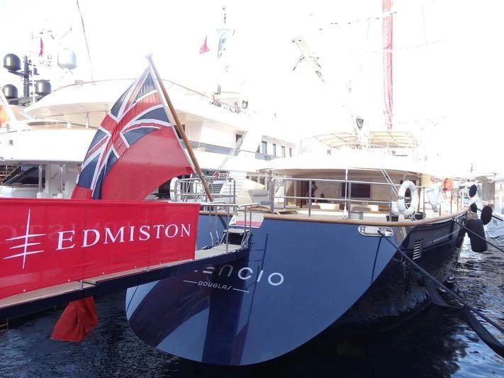 a large boat with a flag on it aboard PERSEUS Yacht for Sale