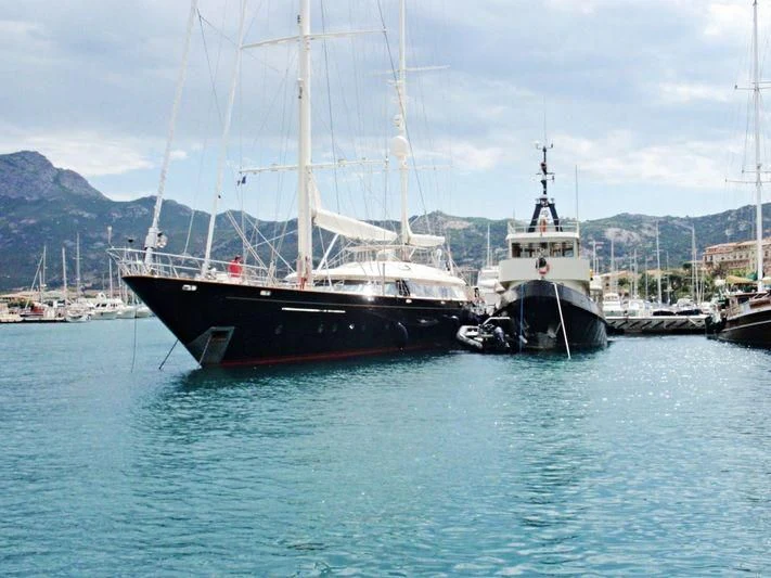 a couple of boats are parked in the water aboard PERSEUS Yacht for Sale