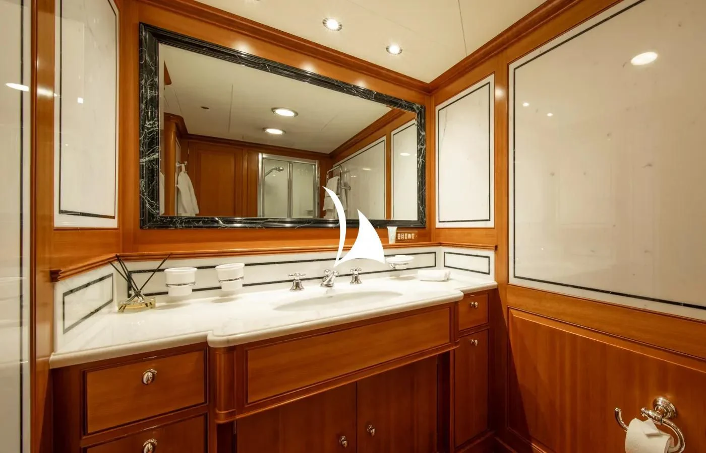 a bathroom with a large mirror aboard PERSEUS Yacht for Sale