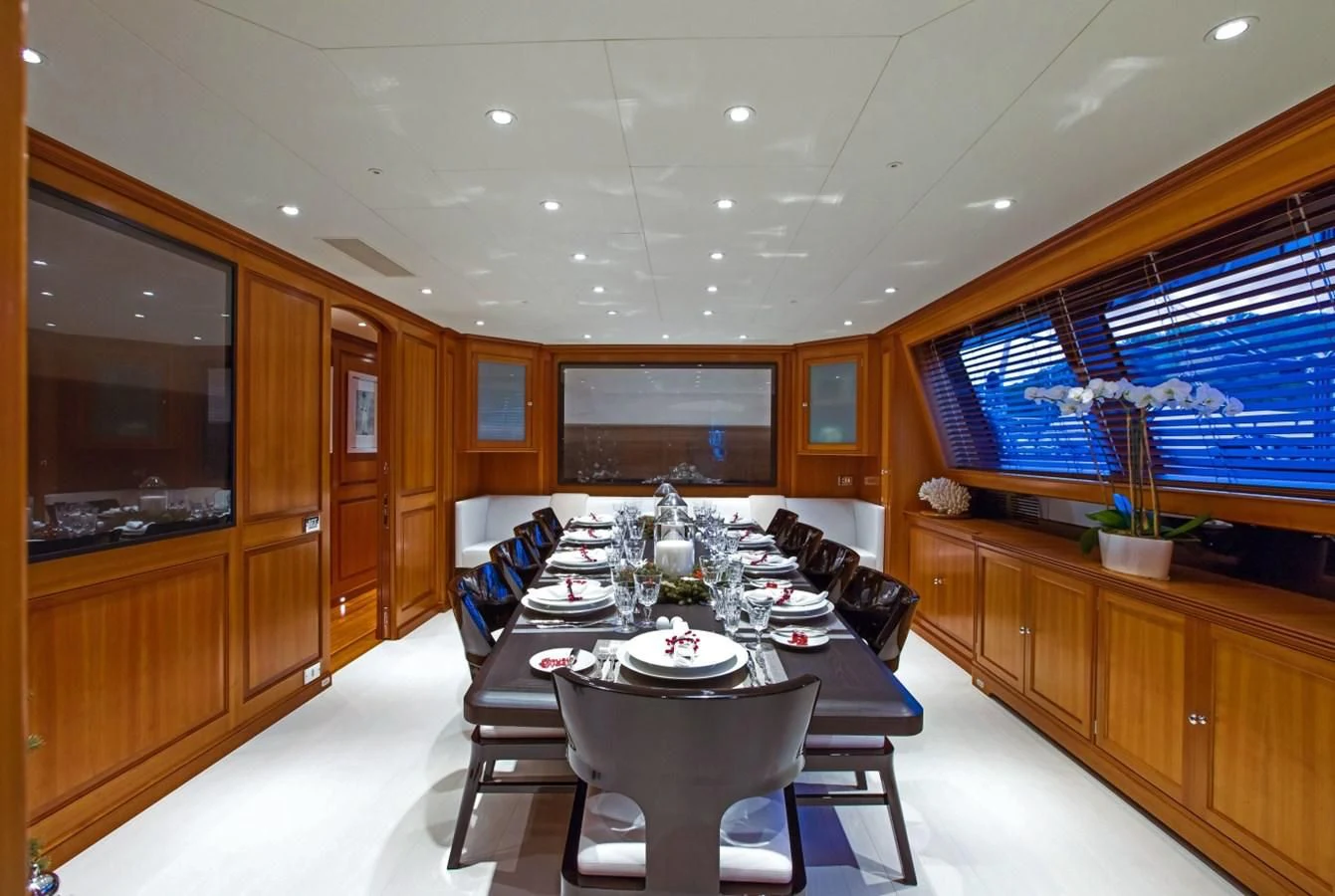 a dining room with a table and chairs aboard PERSEUS Yacht for Sale