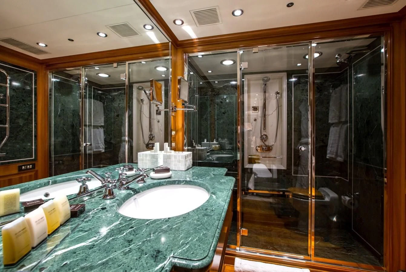 a bathroom with a large glass shower aboard PERSEUS Yacht for Sale